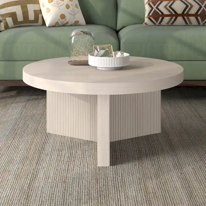Table basse ronde scandinave de 81 cm avec base cannelée et finition aspect bois