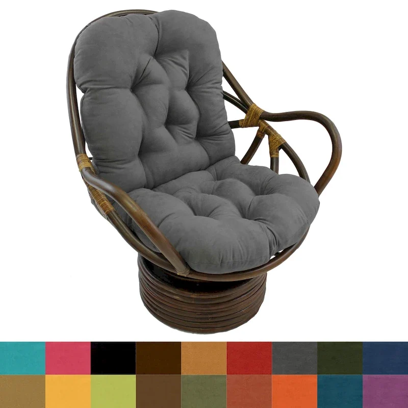 Fauteuil à bascule pivotant en rotin avec coussin en microsuède capitonné et dossier haut