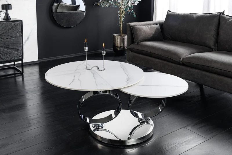 Table basse design DANCING RINGS ronde blanche tournante en marbre céramique structure chromée