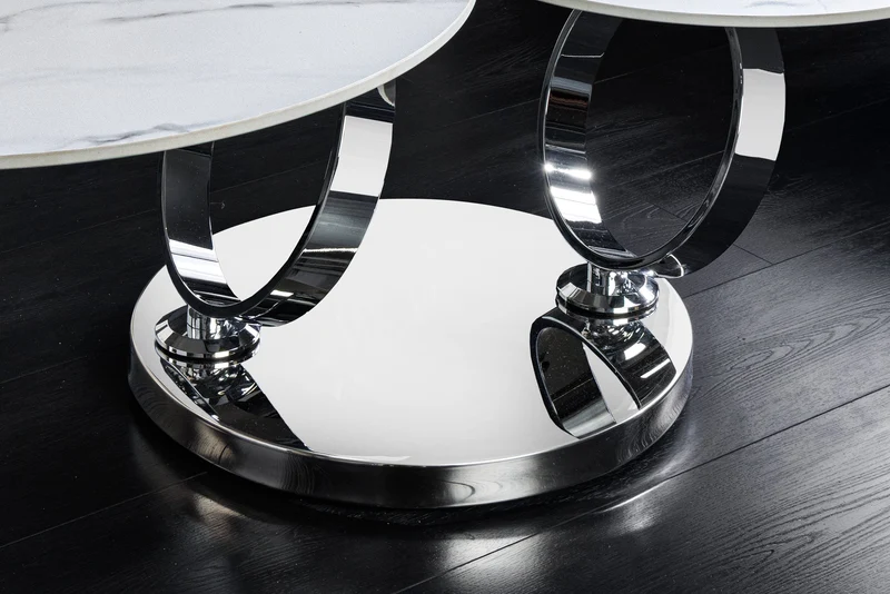 Table basse design DANCING RINGS ronde blanche tournante en marbre céramique structure chromée