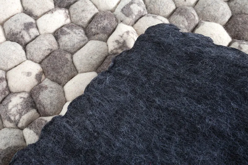 Tapis en laine vierge tissé main ORGANIC LIVING 200x120cm feutre gris aspect pierre