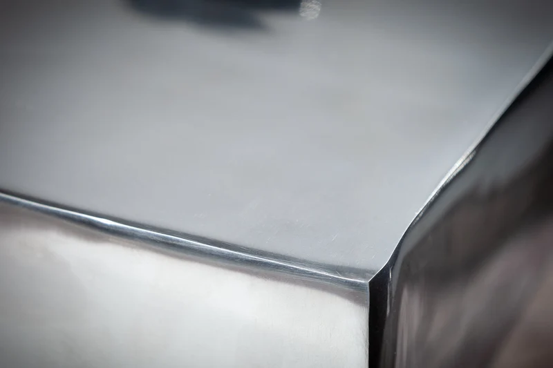 Table d’appoint sculpturale TWIST 45cm tabouret en aluminium poli argent design moderne