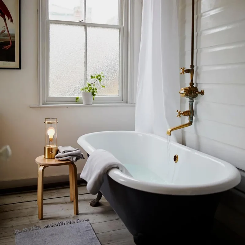 The Muse 2.0 Portable Lamp in Solid Brass