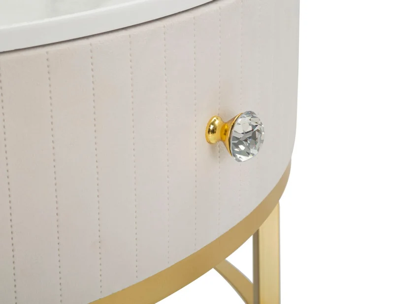 Table basse ronde à motifs de marbre crème et blanc