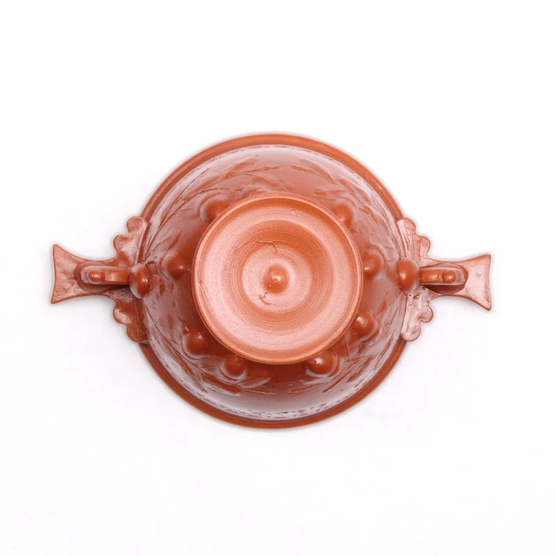 Tasse à vin romain avec reliefs de glands et manche - céramique sigillée