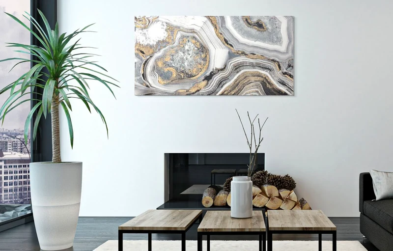 Peinture sur toile grise et dorée