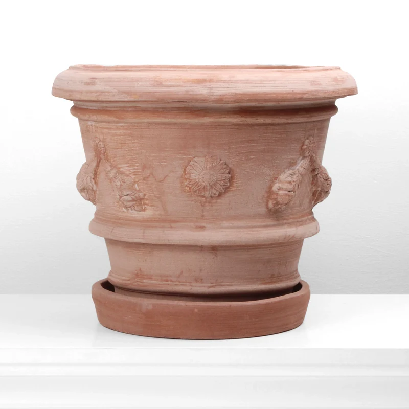 Petit pot de fleurs en terre cuite