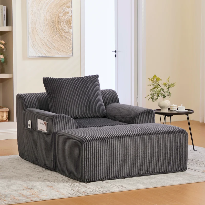 Canapé simple fauteuil XXL en velours côtelé gris, dossier profond, repose pied, coussin & poches latérales, sans montage HOTSPRINGPOOL